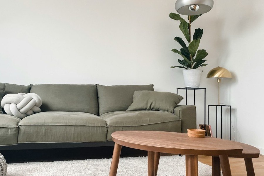 A tidy living room with a sofa and low table
